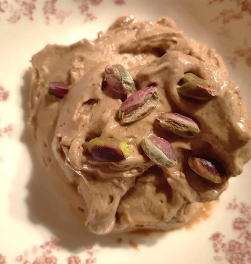 banana peanut butter ice cream ball decorated with pistachios