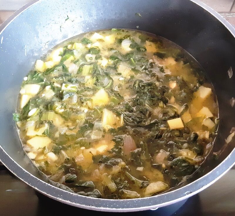 Dish with orange color vegetable cream soup