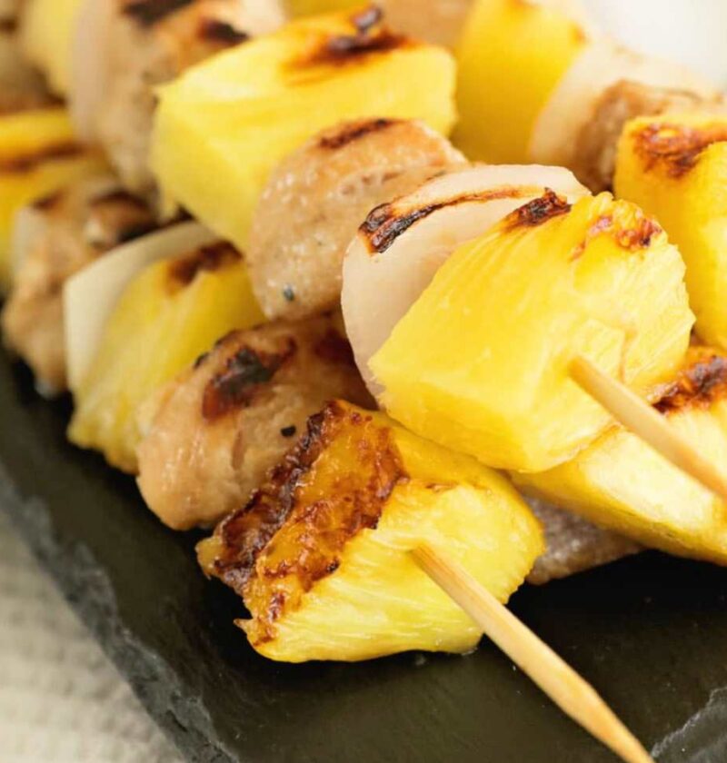 wood skewers with chicken and ananas chunks