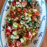 A plate with grains and vegetables