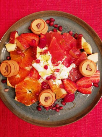 Plate with red fruits and yoghurt