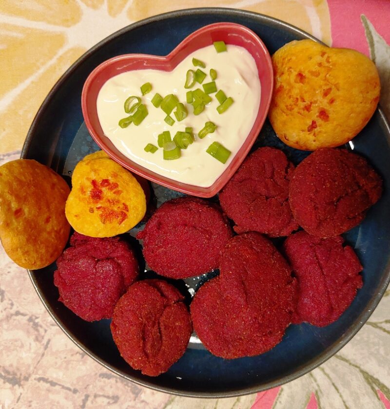 red beetroot balls in a plate with white dipping sauce